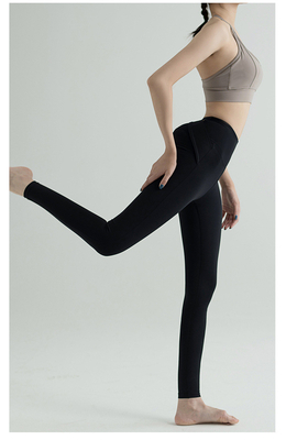 Yeni yüksek bel yoga pantolonları kadınlar Avrupa ve ABD Şeftali kalça egzersizleri sıkı koşma hızı kuru yoga giysileri
